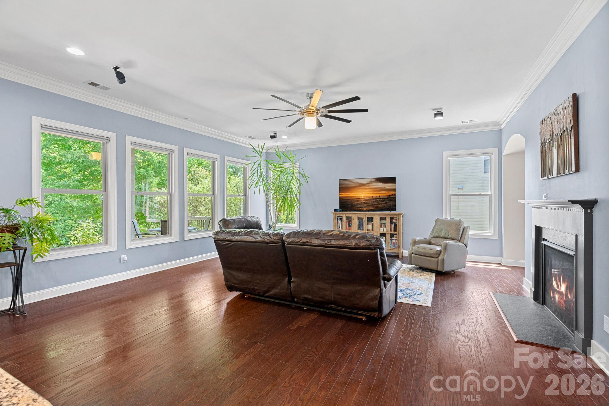 897 Tyne Drive Fort Mill, SC 29715 - Photo 38 of 46 a living room with furniture fireplace and a large window