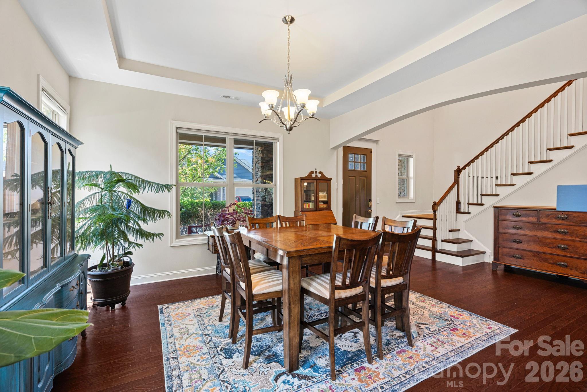 897 Tyne Drive Fort Mill, SC 29715 - Photo 39 of 46 a view of a dining room with furniture window and wooden floor