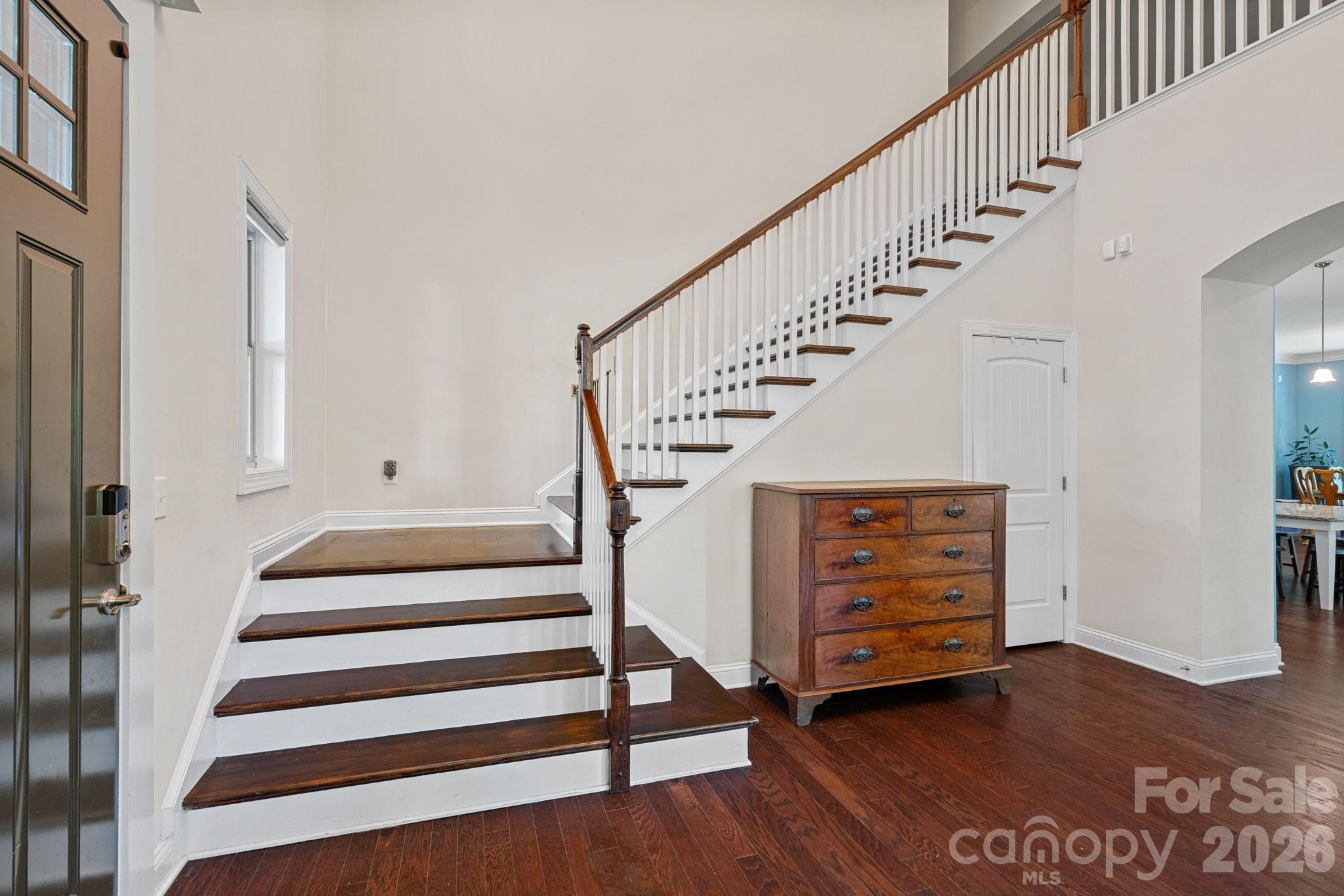 897 Tyne Drive Fort Mill, SC 29715 - Photo 40 of 46 a view of entryway with wooden floor and stairs