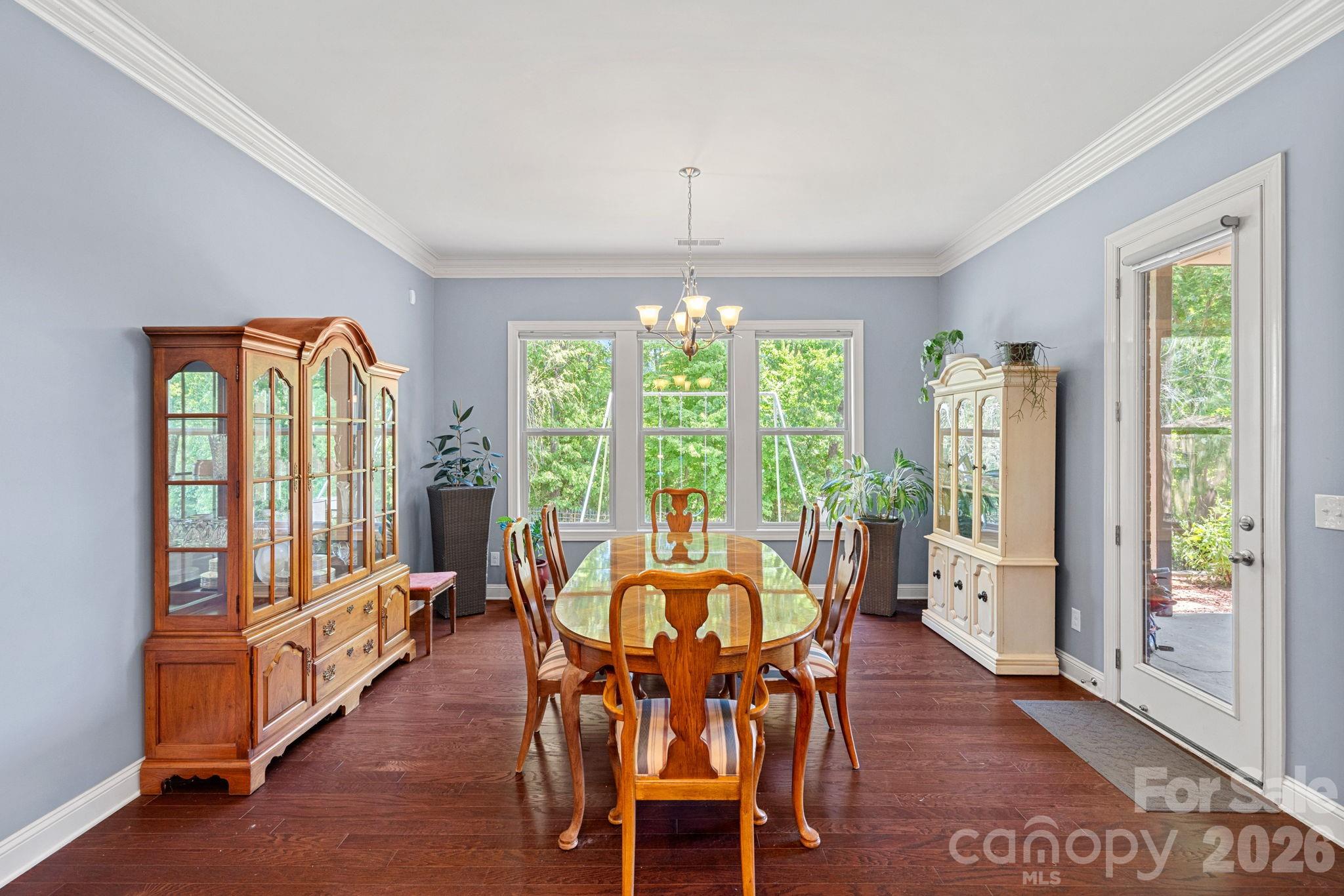 897 Tyne Drive Fort Mill, SC 29715 - Photo 8 of 46 a view of a dining room with furniture window and outside view