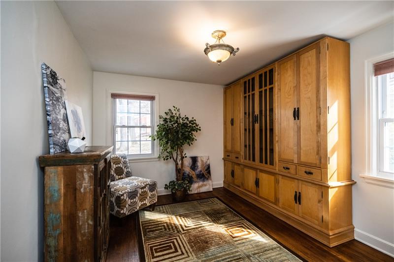 8012 Thompson Run Road Pittsburgh, PA 15237 - Photo 14 of 25 The first floor den or possible bedroom has amazing high end custom cabinetry making the room very versatile.