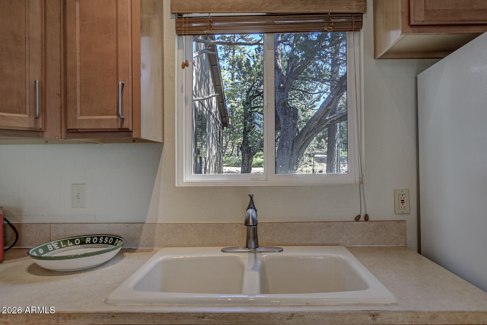 4880 Tor Street Pine, AZ 85544 - Photo 11 of 34 a bathroom with a bathtub and a window