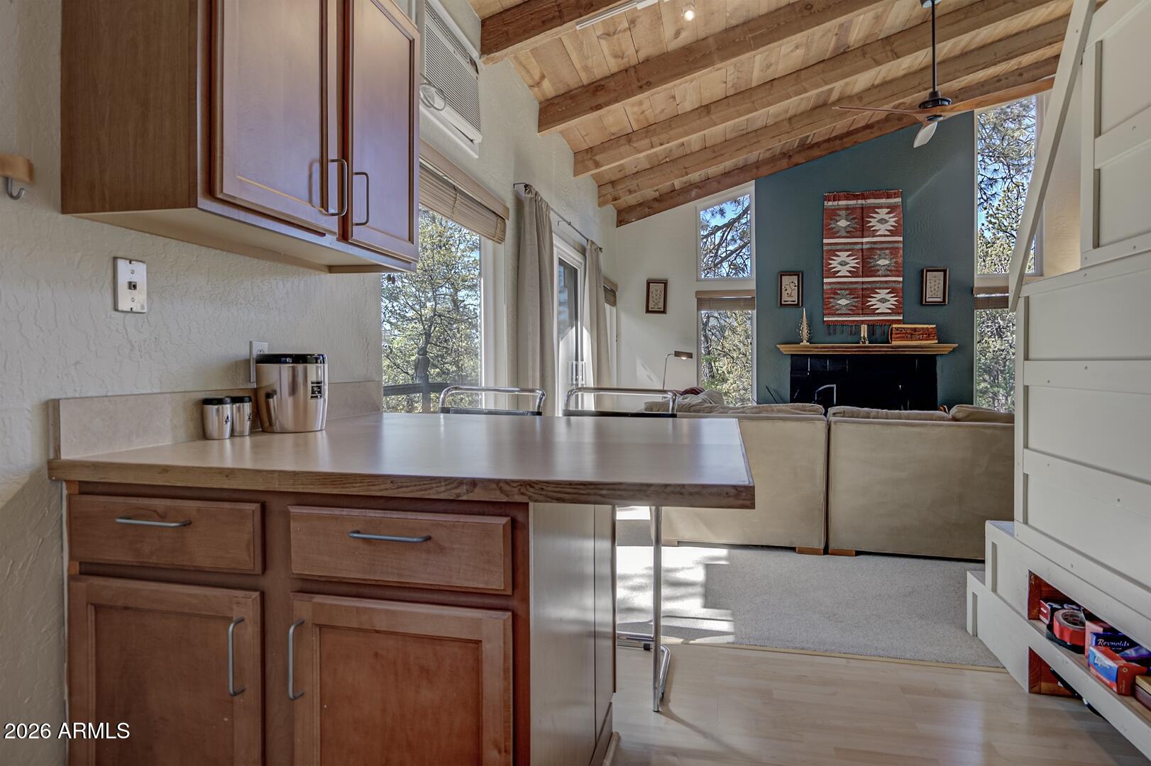 4880 Tor Street Pine, AZ 85544 - Photo 13 of 34 a kitchen with cabinets and window
