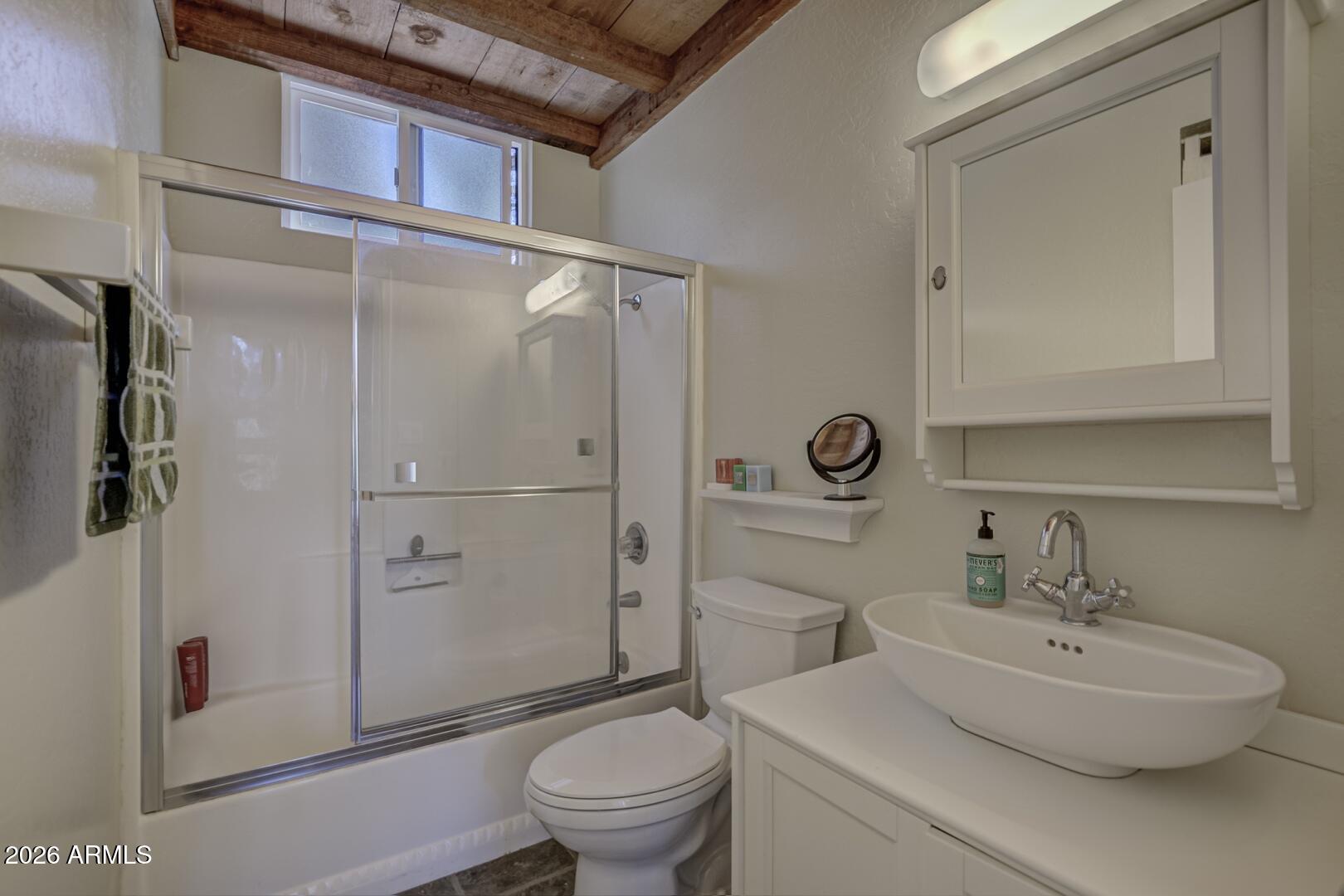 4880 Tor Street Pine, AZ 85544 - Photo 15 of 34 a bathroom with a sink toilet and shower