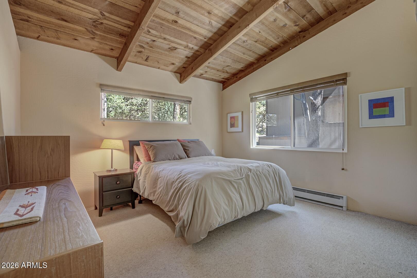 4880 Tor Street Pine, AZ 85544 - Photo 16 of 34 a bedroom with bed and wooden floor