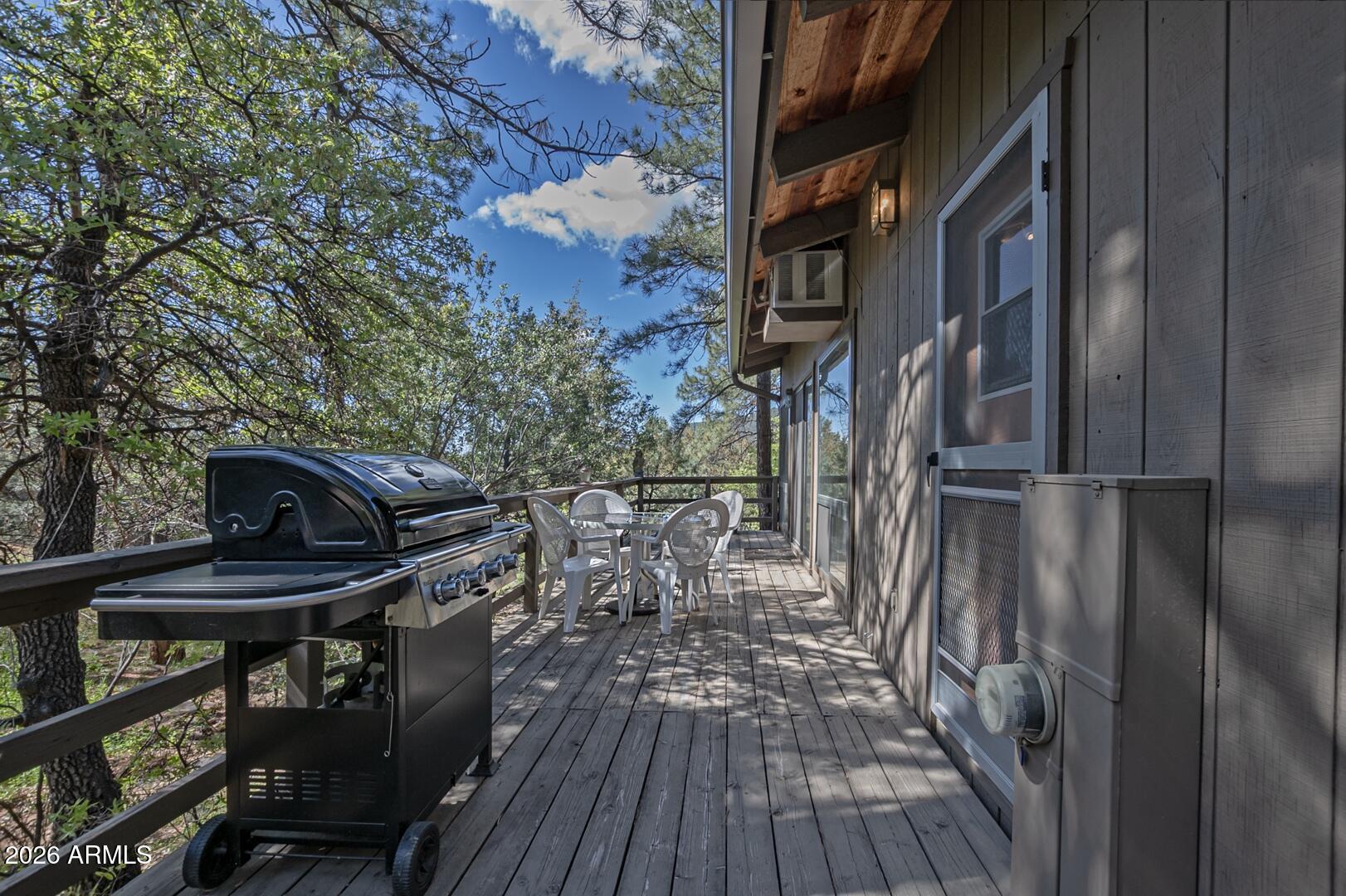 4880 Tor Street Pine, AZ 85544 - Photo 22 of 34 a view of balcony and deck with wooden floor