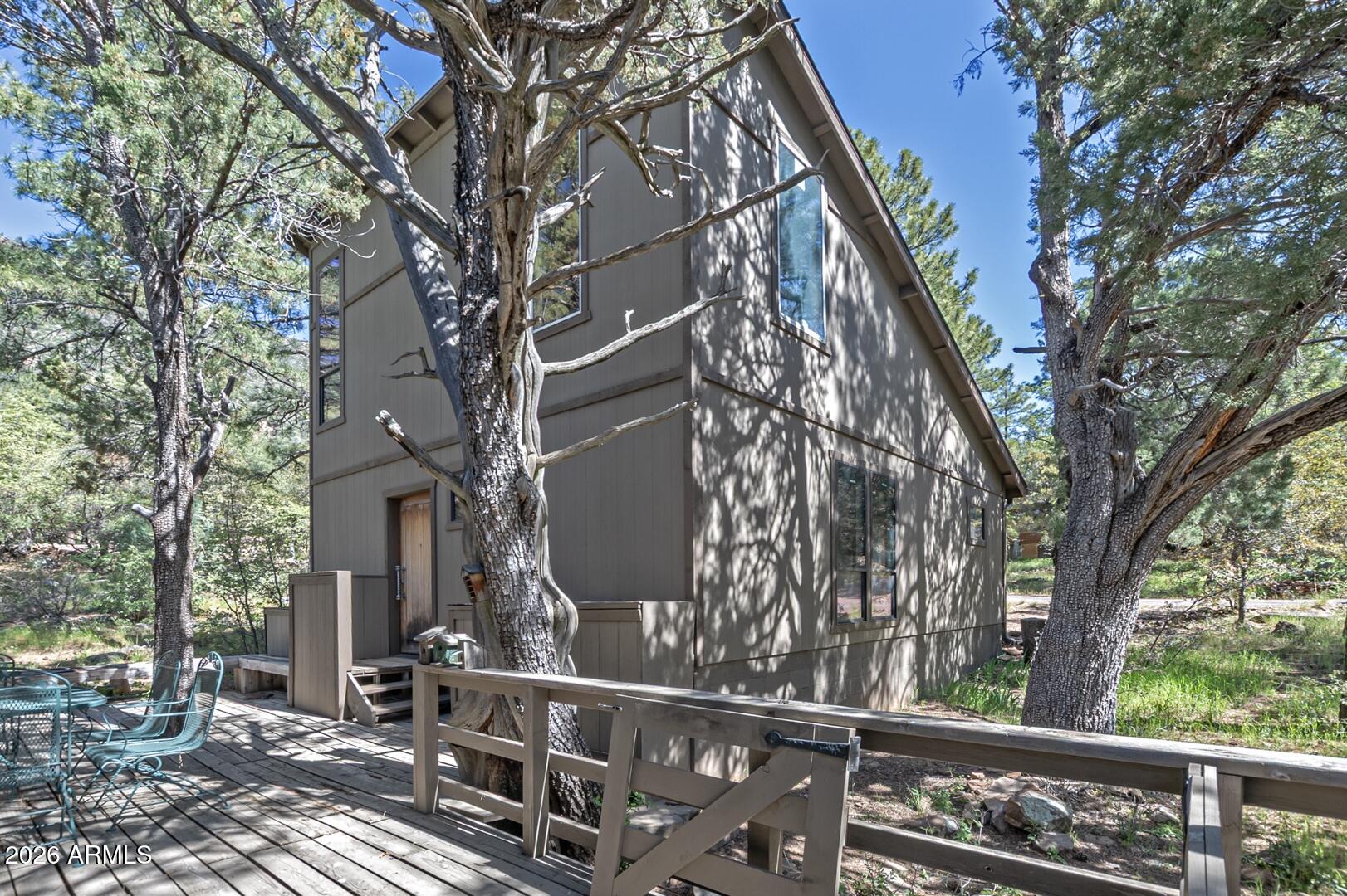 4880 Tor Street Pine, AZ 85544 - Photo 24 of 34 a view of a house with a large tree