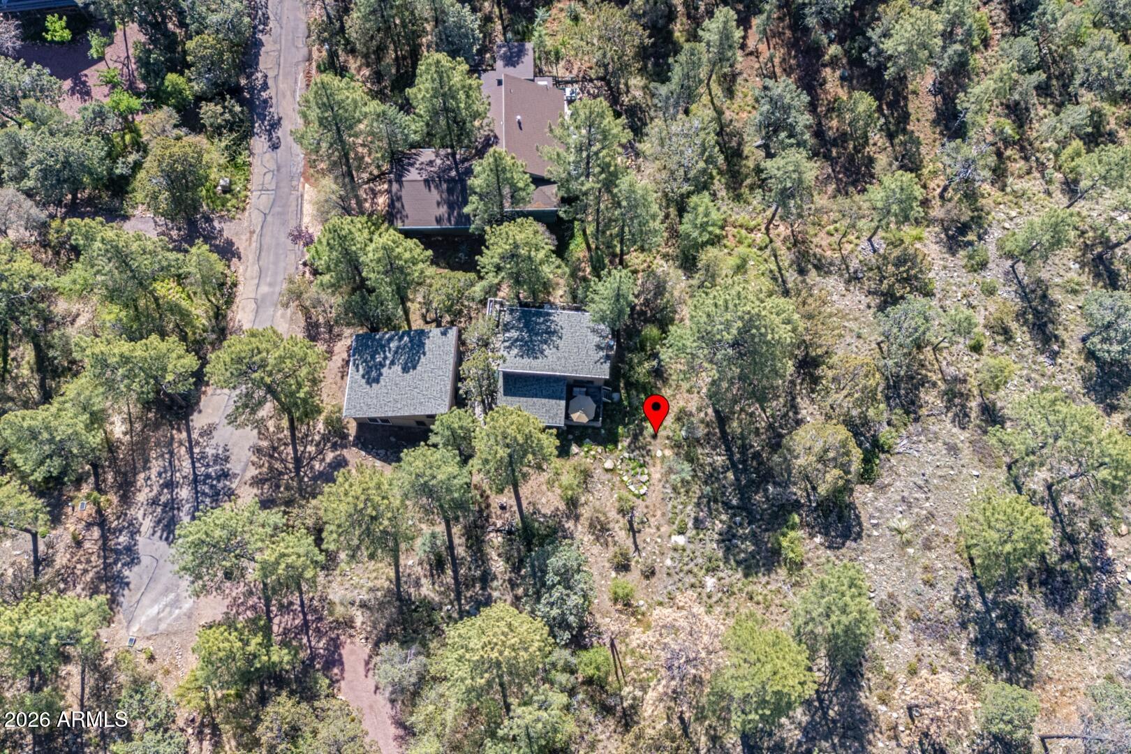 4880 Tor Street Pine, AZ 85544 - Photo 28 of 34 an aerial view of house with yard and sign board