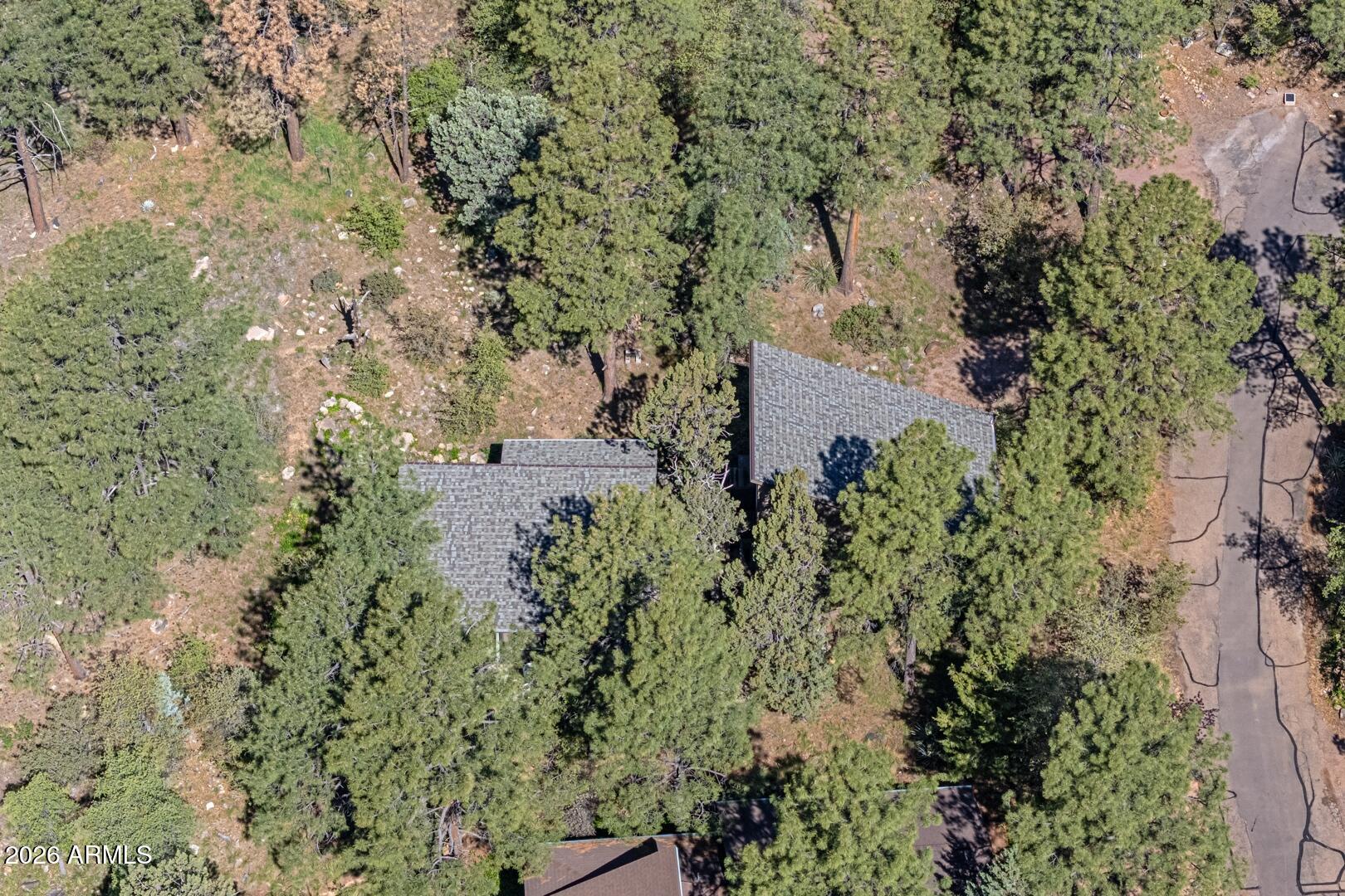 4880 Tor Street Pine, AZ 85544 - Photo 29 of 34 an aerial view of a house with a yard