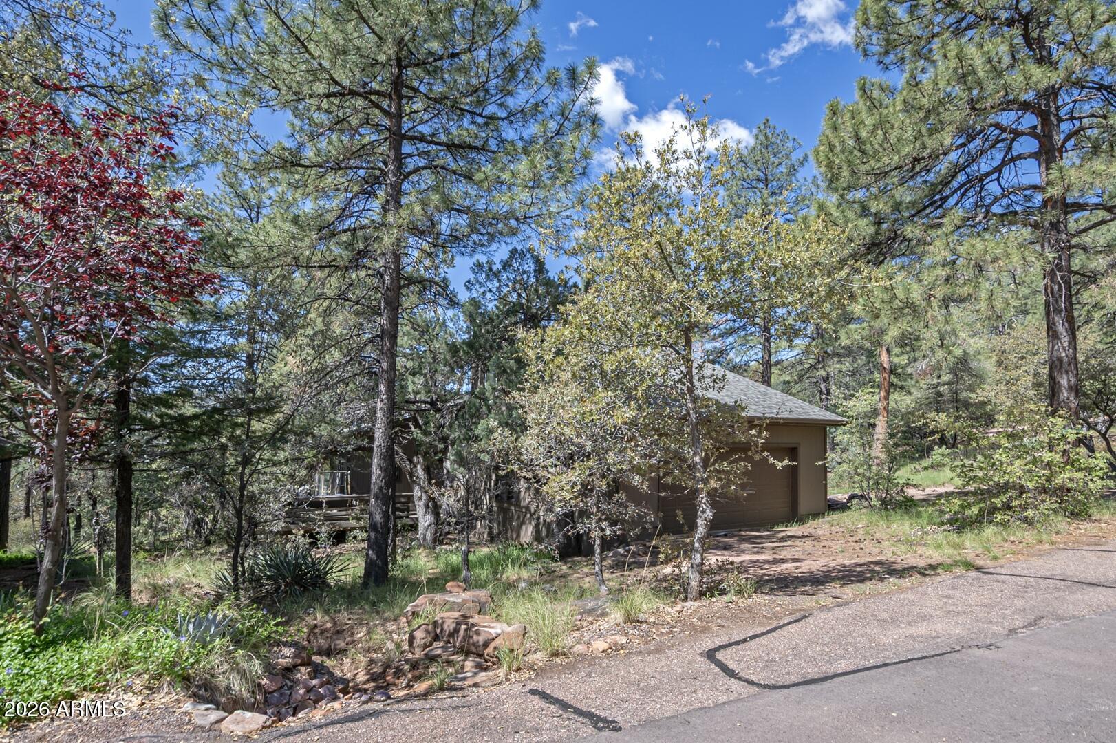 4880 Tor Street Pine, AZ 85544 - Photo 33 of 34 a view of a house with a tree