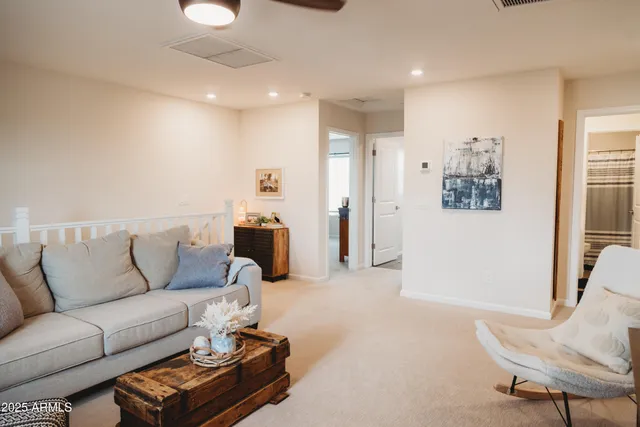 a bedroom with a bed and a table in it