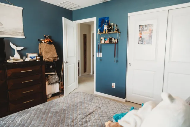 a room with furniture and flat screen tv