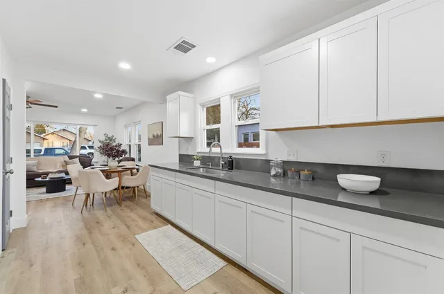 a kitchen with counter space cabinets and appliances