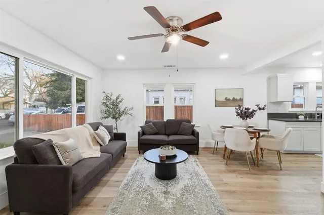 a living room with furniture and view of living room