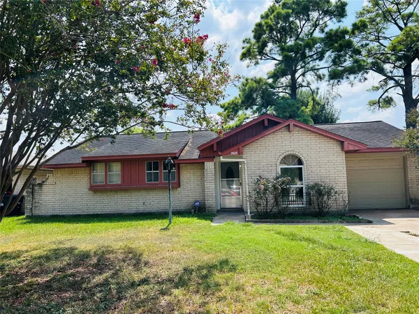 a front view of a house with yard