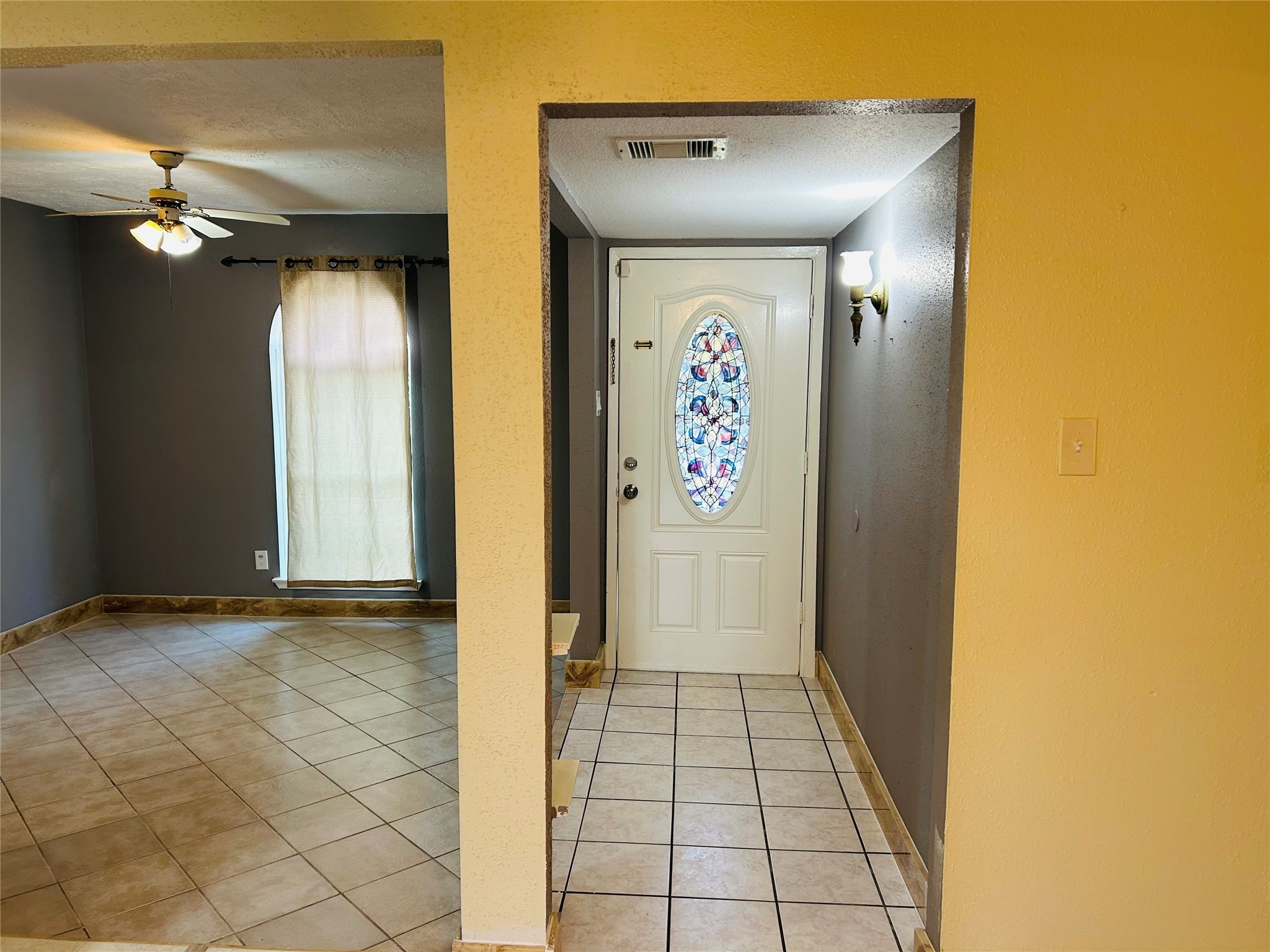 7619 Vernwood Street Houston, TX 77040 - Photo 6 of 25 a view of a hallway with wooden door
