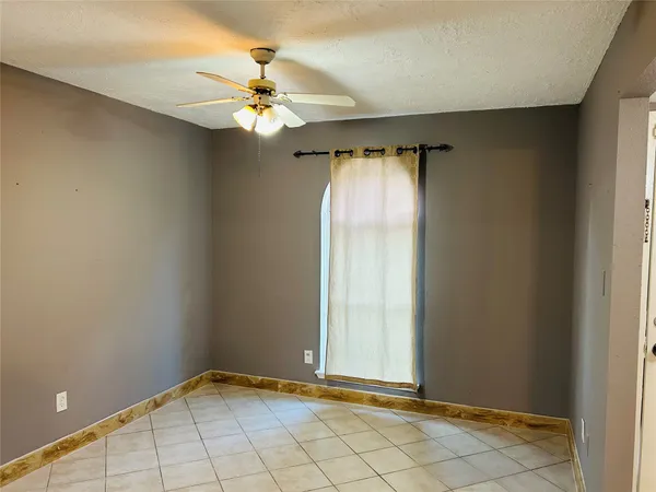 a kitchen with stainless steel appliances a sink a stove and a refrigerator