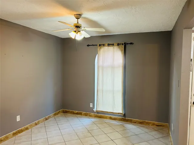 a kitchen with stainless steel appliances a sink a stove and a refrigerator
