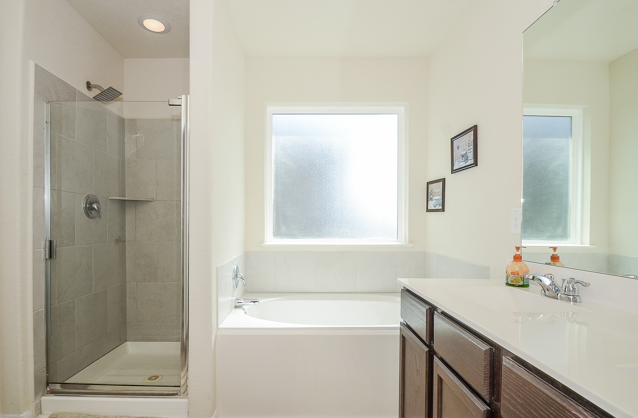 3027 Narrow Stream Way Katy, TX 77493 - Photo 23 of 32 Primary bath with soaking tub, walk-in shower, and double vanities