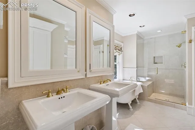 a bathroom with a double vanity sink mirror and double