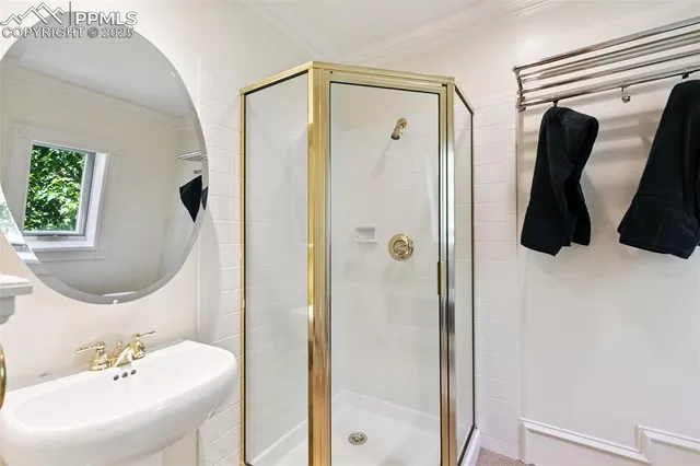 a bathroom with a sink and mirror