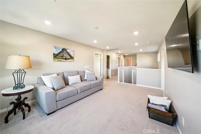 a living room with furniture and a table