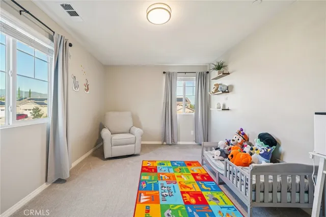 a bedroom with furniture and a couch