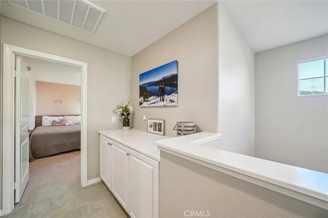 a view of hallway with washer and dryer