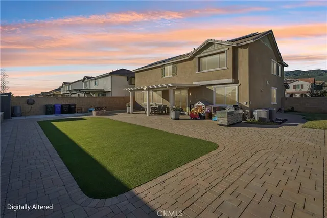 a view of a house with a patio