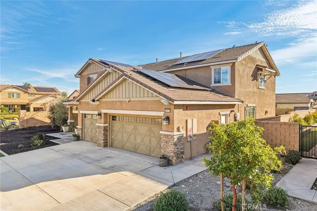 a view of a swimming pool with an outdoor seating