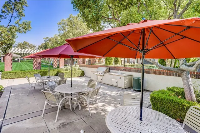 a view of a park with swings and slides
