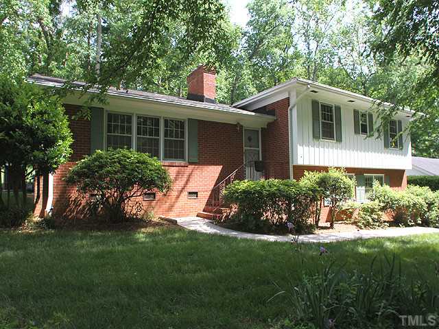 2452 Oxford Road Raleigh, NC 27608 - Photo 1 of 25 a view of a house with a yard and plants