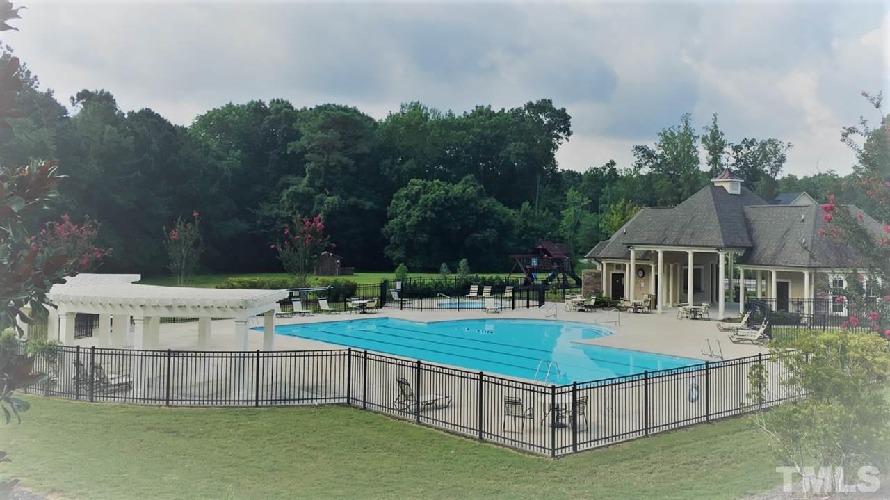 4213 Banks Ridge Way Raleigh, NC 27603 - Photo 2 of 4 a view of a house with pool and a yard