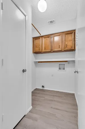 a view of room and wooden floor