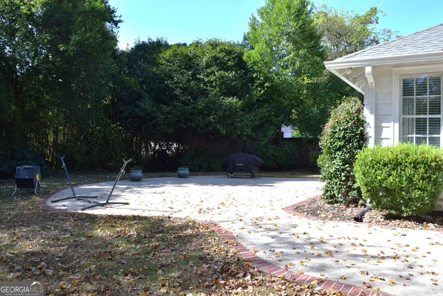 a backyard of a house with lots of green space