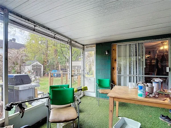 a view of an house with backyard space and garden