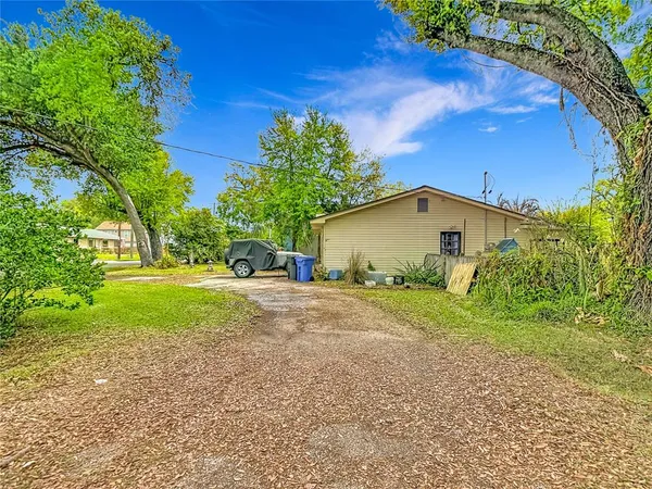 an aerial view of a house with a garden