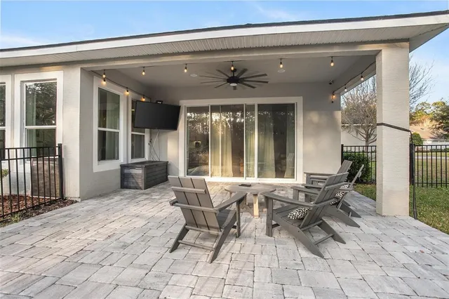 a view of a lobby with furniture and floor to ceiling window