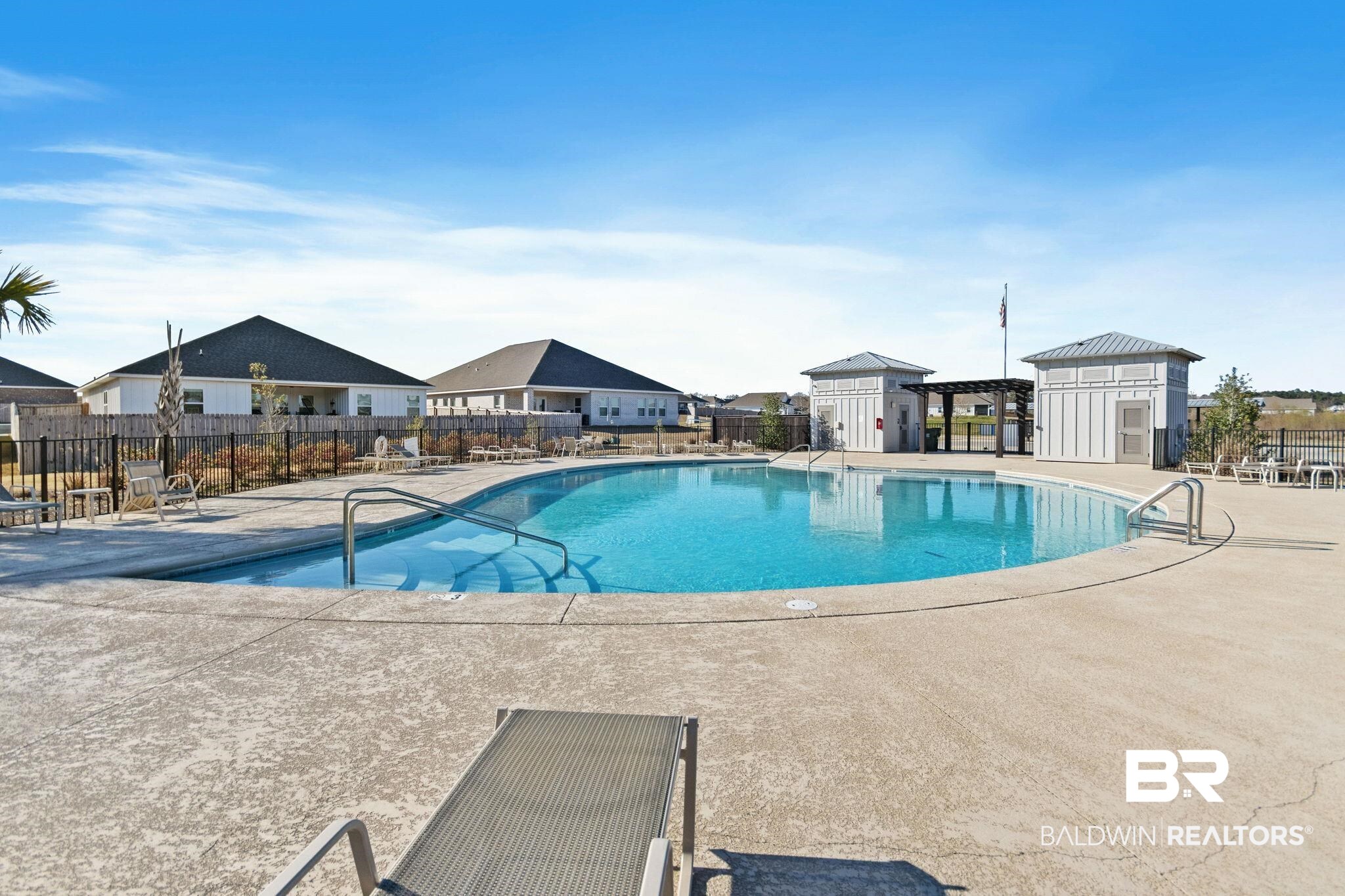 12919 Torrent Road Fairhope, AL 36532 - Photo 54 of 74 Community pool featuring a patio area