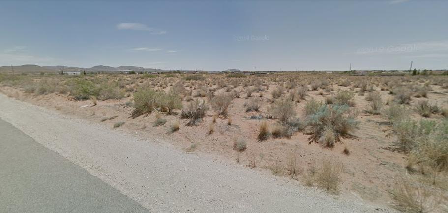14300 Derringer Road El Paso, TX 79938 - Photo 1 of 1 a view of beach and yard