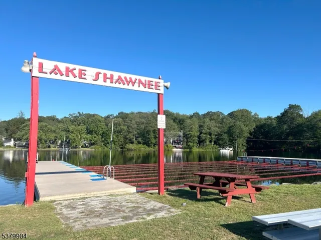 a view of a park with swings and slides