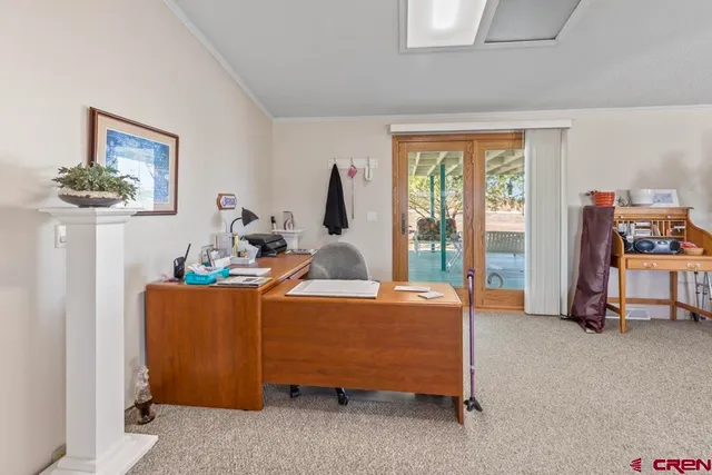a bed room with furniture and a window