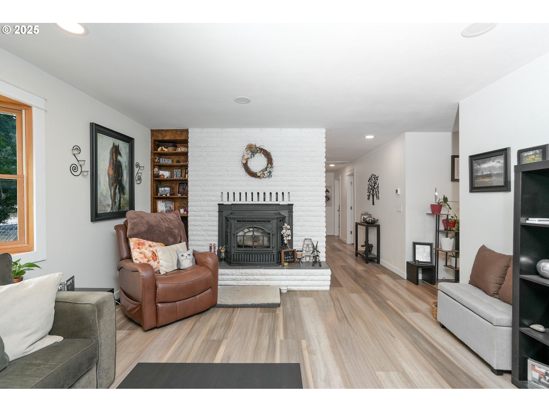 1780 Clover Ridge Road Northeast Albany, OR 97322 - Photo 16 of 45 a living room with furniture and a fireplace