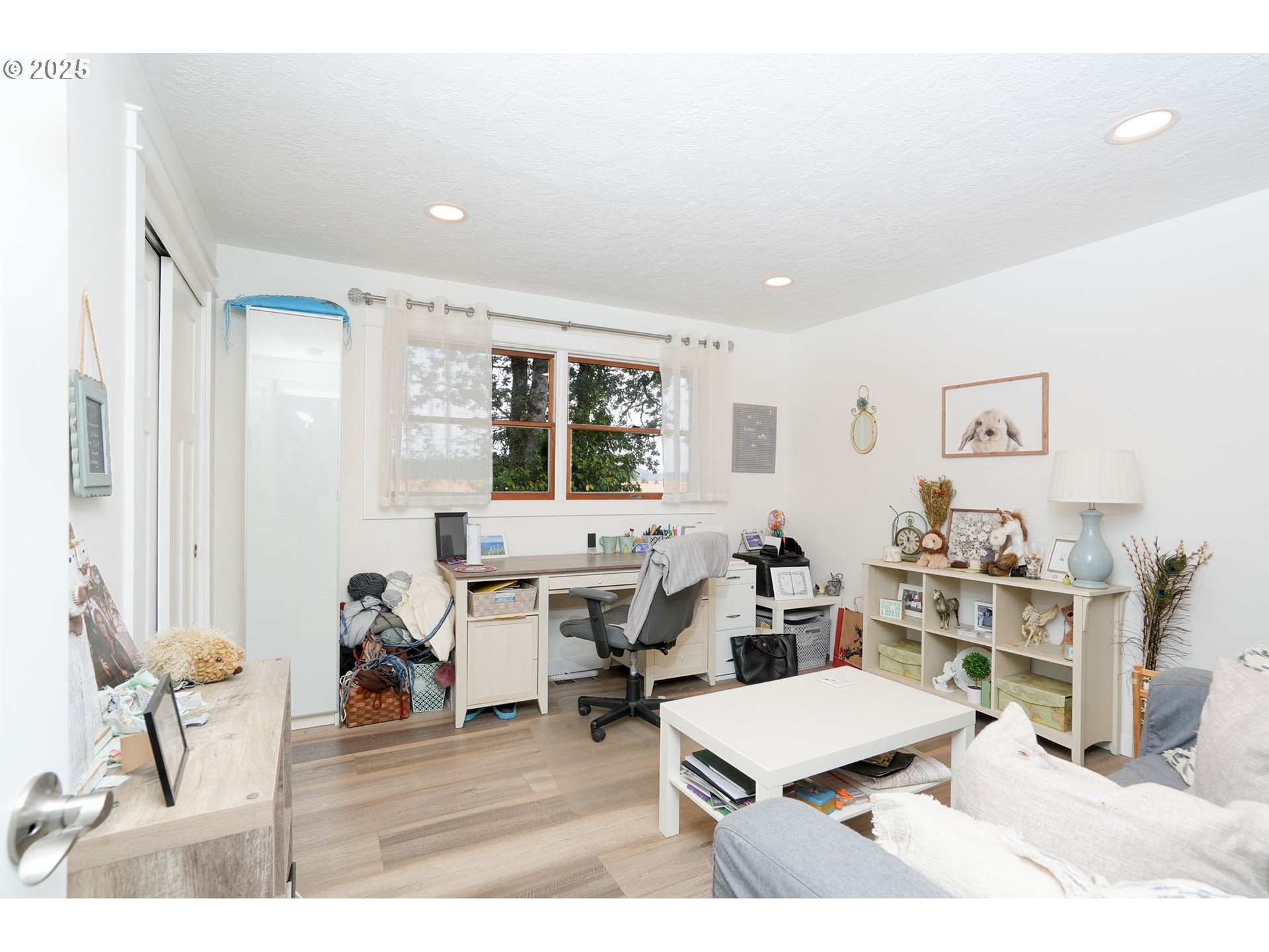1780 Clover Ridge Road Northeast Albany, OR 97322 - Photo 21 of 45 a living room with lots of furniture and a large window