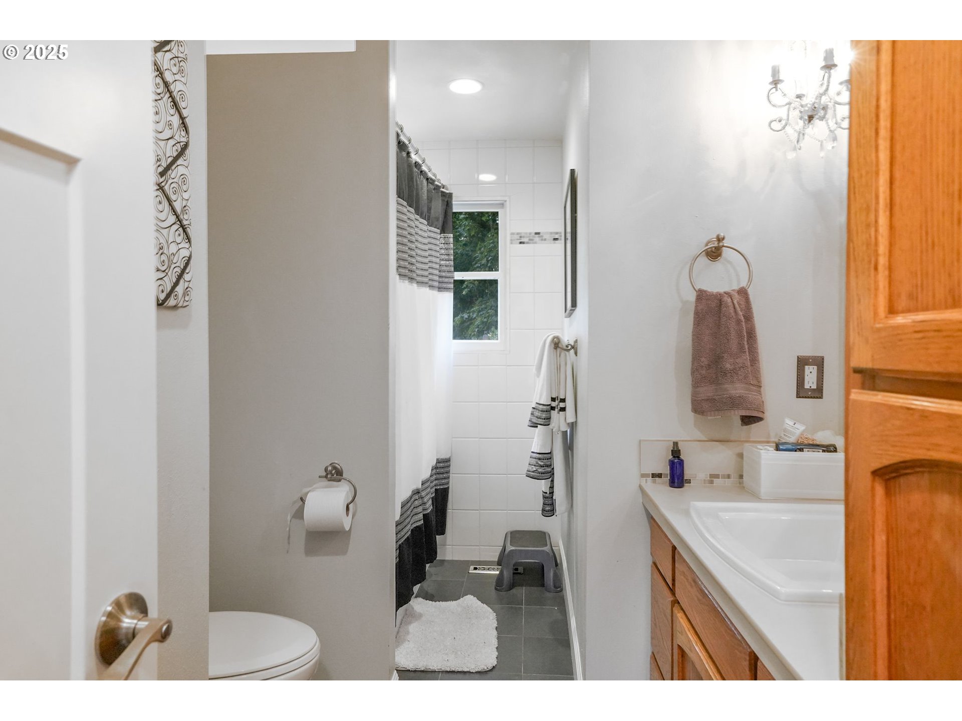 1780 Clover Ridge Road Northeast Albany, OR 97322 - Photo 23 of 45 a bathroom with a sink mirror and vanity