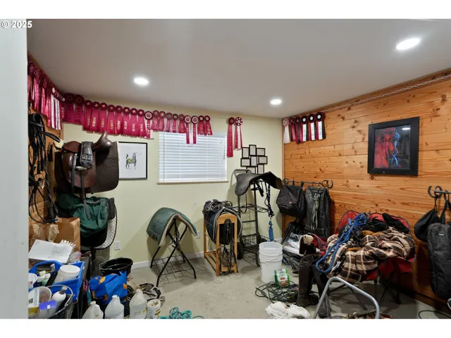 a view of a house with a car parked in front of it