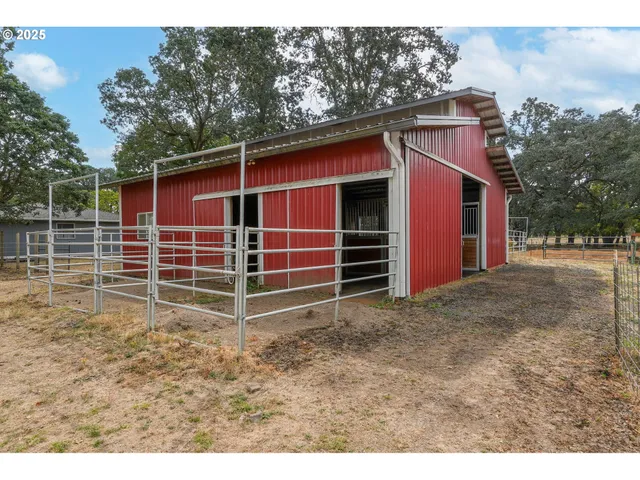 a house with trees in the background