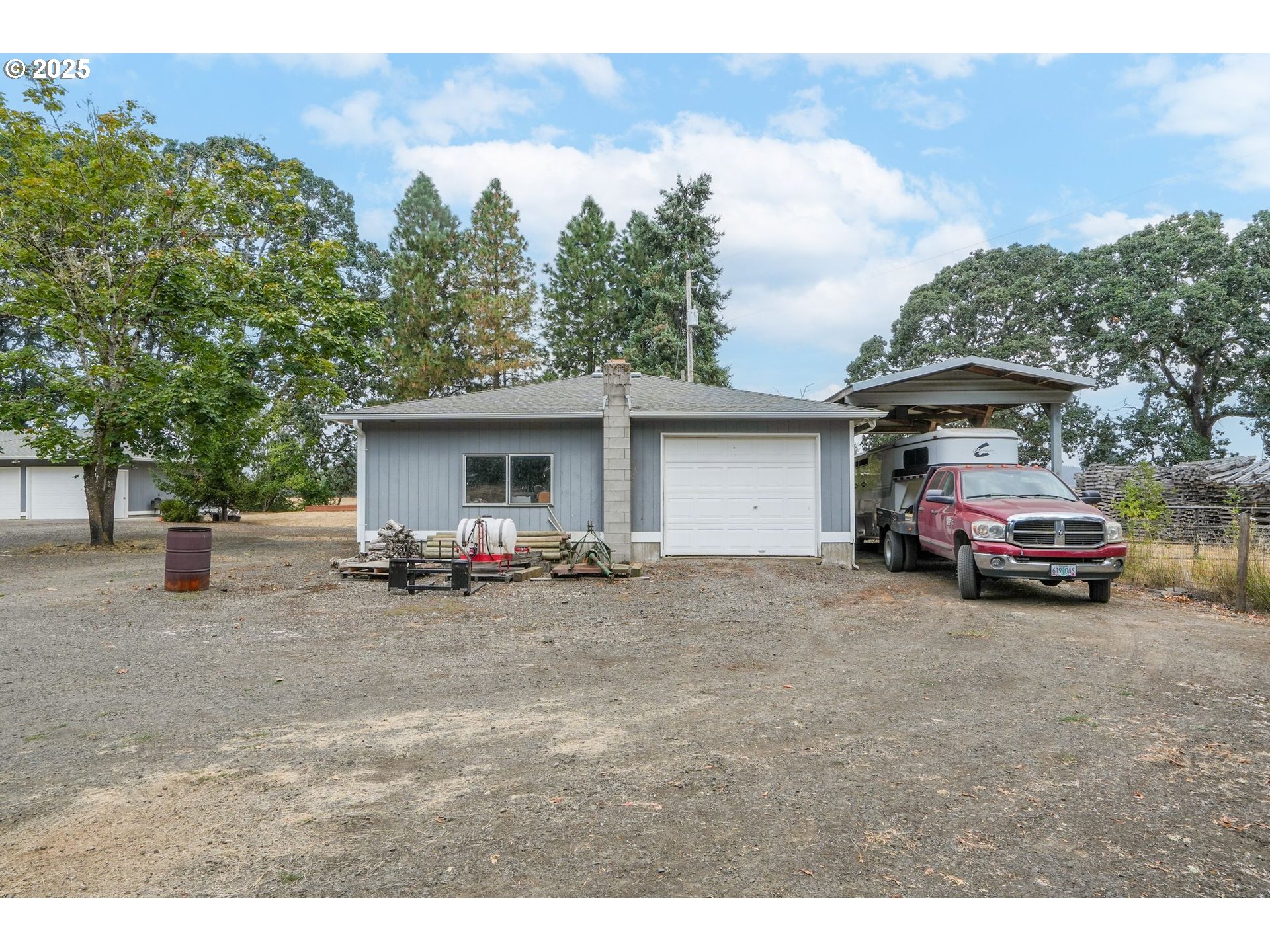 1780 Clover Ridge Road Northeast Albany, OR 97322 - Photo 43 of 45 a view of a house with a car parked in front of it