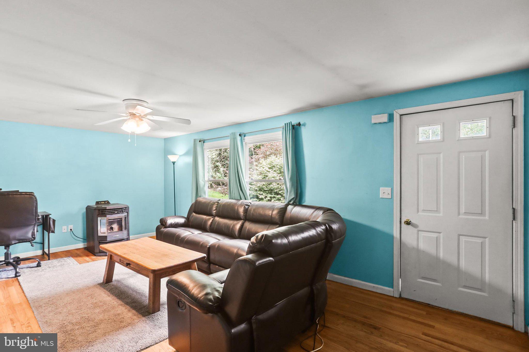 964 Aubel Road Delta, PA 17314 - Photo 7 of 45 a living room with furniture and wooden floor