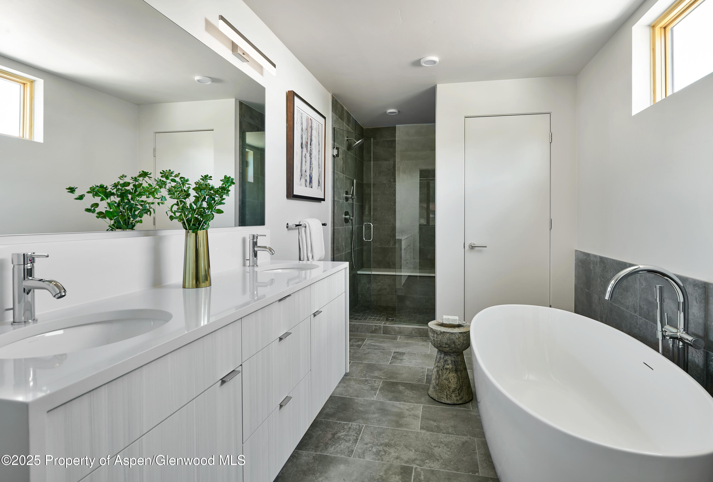 129 Valley Court Basalt, CO 81621 - Photo 22 of 26 a bathroom with a double vanity sink toilet and shower